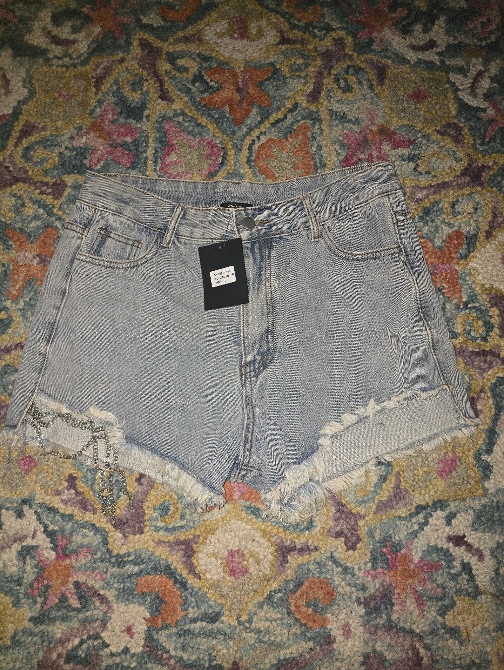 High-Rise Light Blue Denim Cutoff Shorts with Frayed Hem
